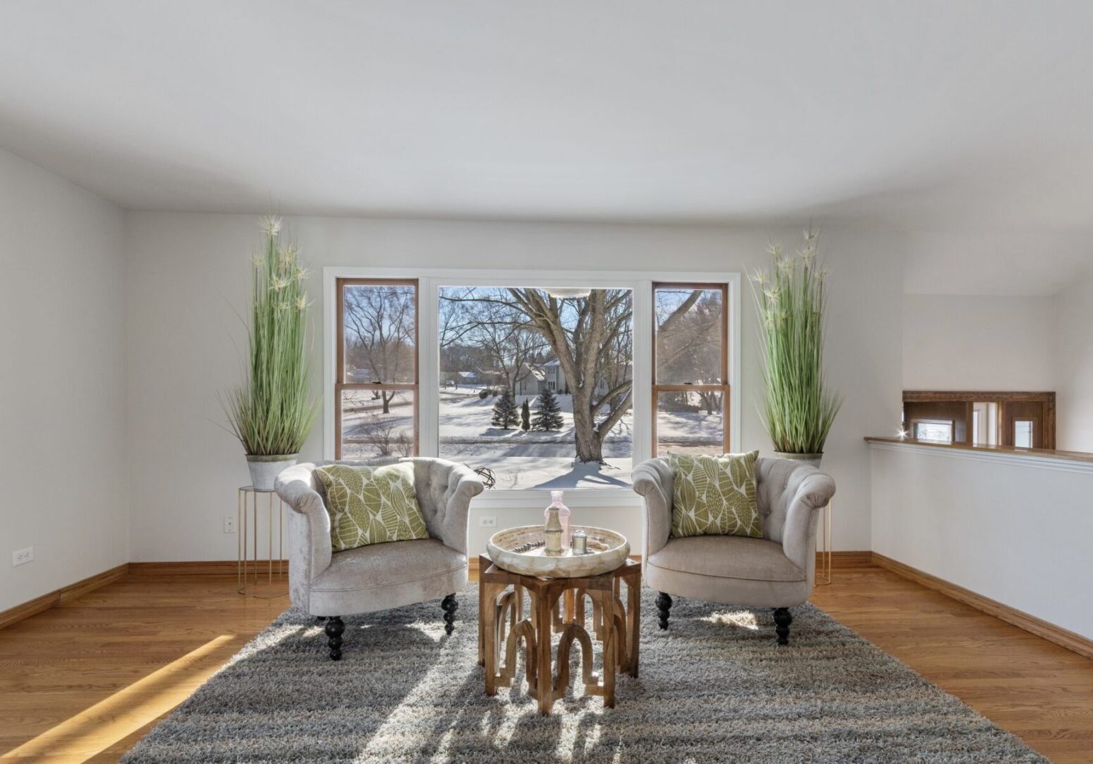 Two Grey Color Couches With Green Throw Pillows